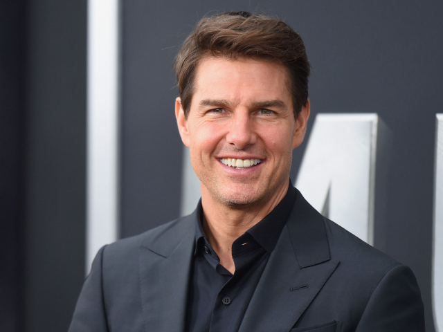 Популярный улыбающийся актер Том Круз