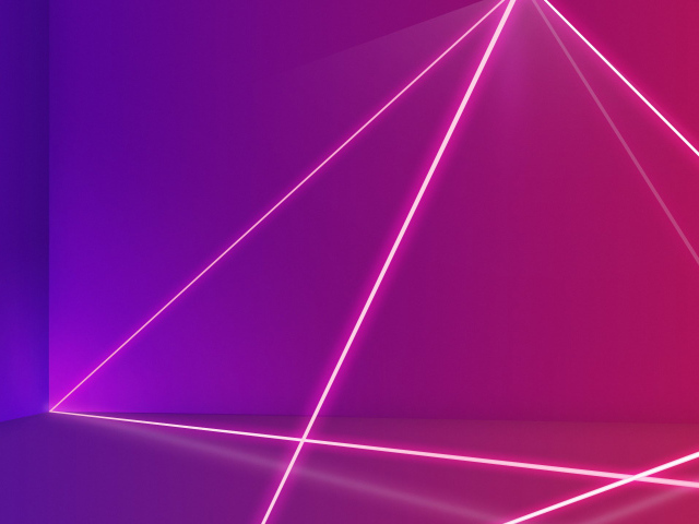 Розовые лазерные лучи на сиреневом фоне