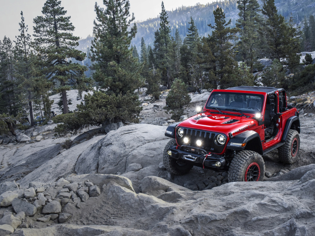 Красный внедорожник  Jeep Wrangler With Mopar, 2018 года в горах 