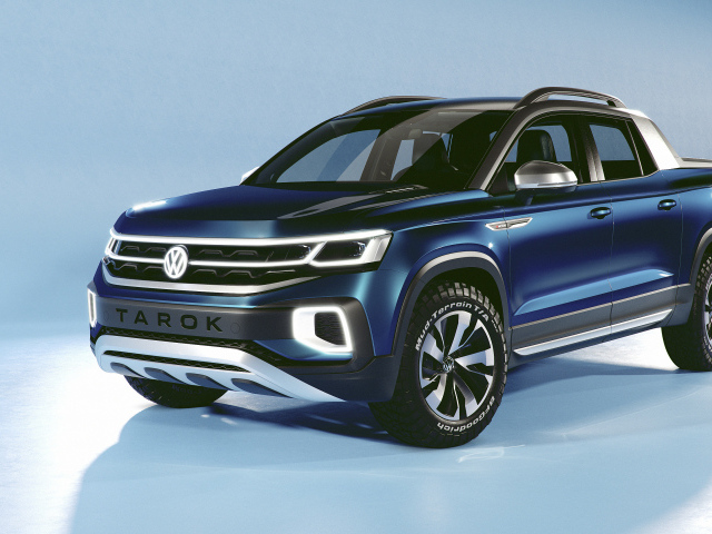 Синий внедорожник Volkswagen Tarok Concept 2019 года на голубом фоне