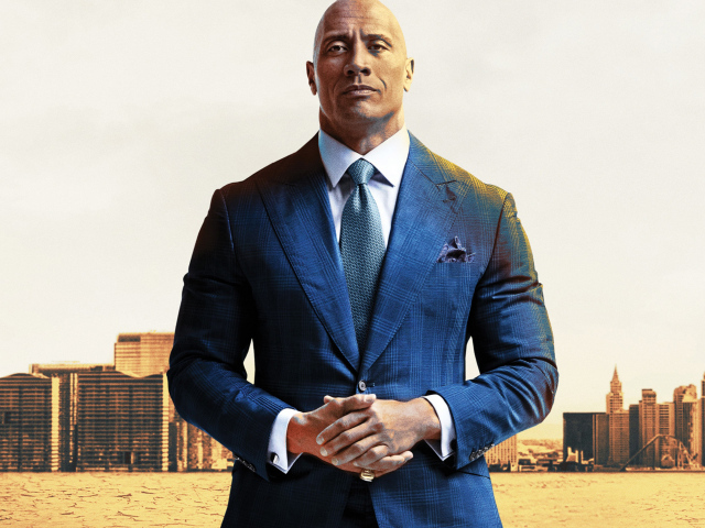 Американский актер Дуэйн Джонсон в костюме