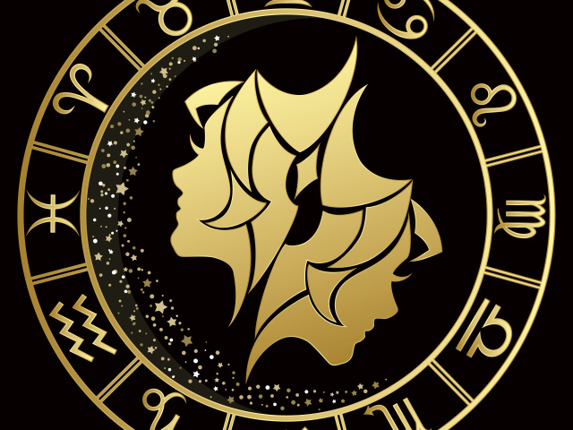 Золотой знак зодиака близнецы на черном фоне