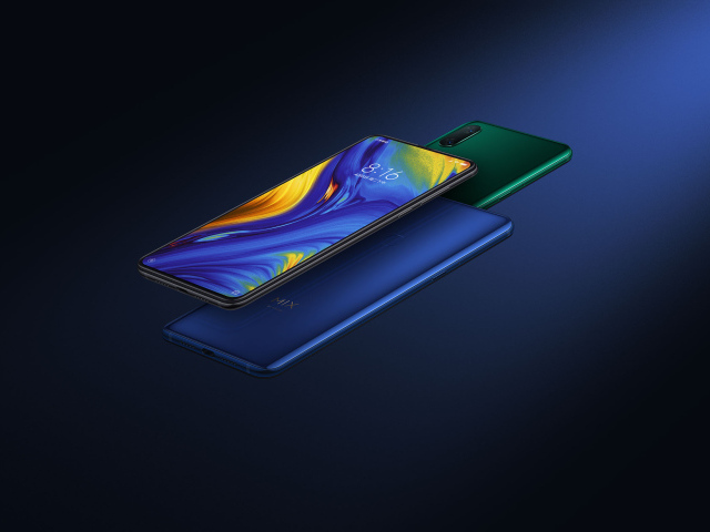 Новый безрамочный смартфон слайдер Xiaomi Mi Mix 3 на синем фоне