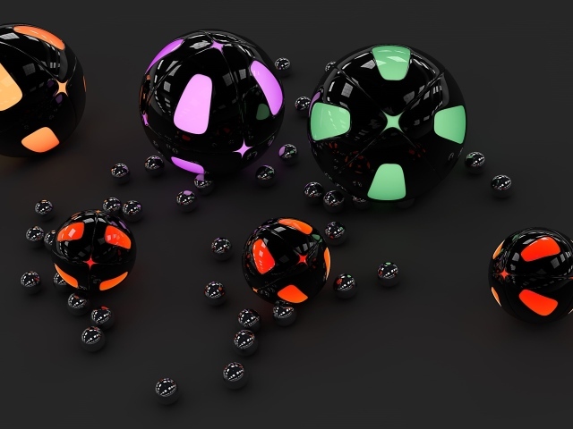 Разноцветные 3д шары на сером фоне 