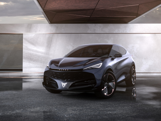 Черный автомобиль Cupra Tavascan Concept в здании 