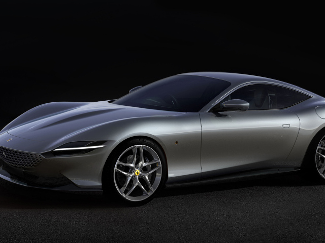 Серый автомобиль Aston Martin DBS Superleggera 2019 года на черном фоне