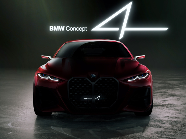 Красный автомобиль BMW Concept 4 2019 года на черном фоне