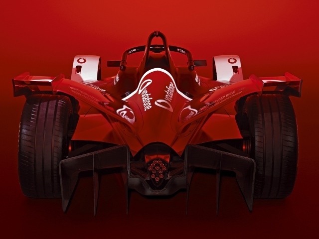 Красный гоночный автомобиль Porsche 99X Electric 2019 года 