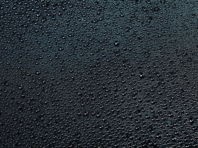 Черный фон с каплями воды 