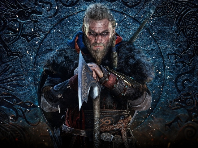 Мужчина викинг с топором в руках 