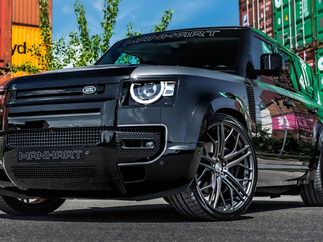 Черный дорогой автомобиль Manhart Defender DP500 2021 года