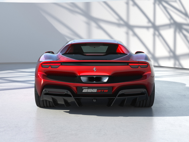 Красный Ferrari 296 GTB 2022 года вид сзади