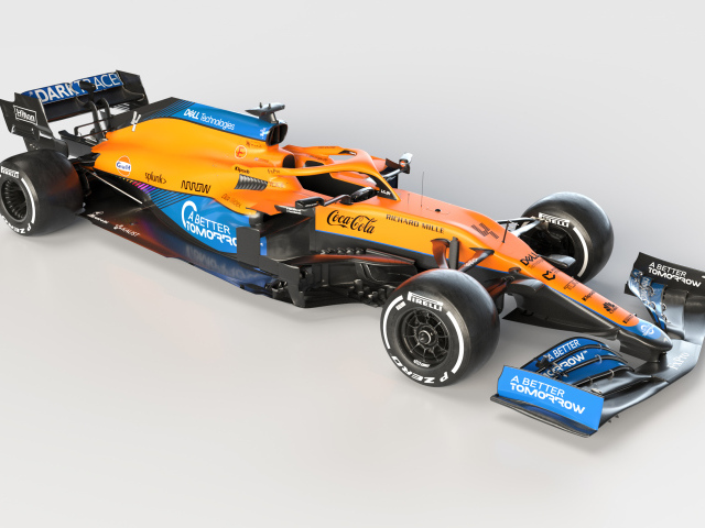 Быстрый гоночный автомобиль McLaren MCL35M 2021 года на сером фоне