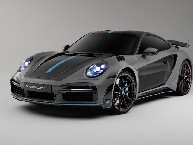 Спортивный автомобиль Porsche 911 Turbo S Stinger GTR 3 2021  года на сером фоне