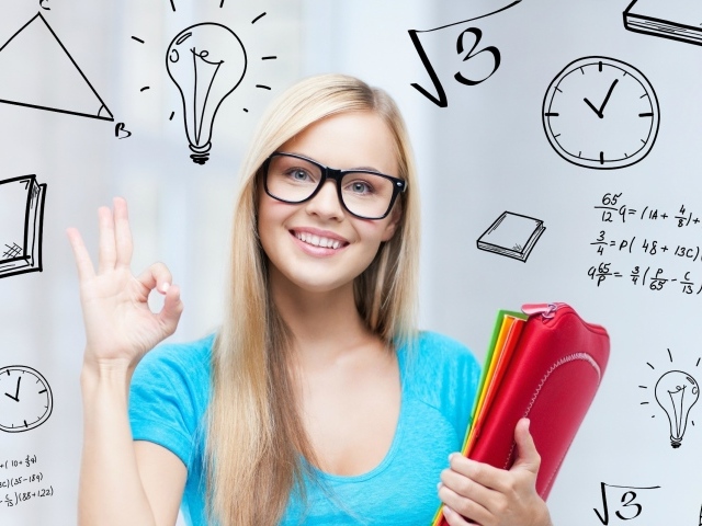 Красивая девушка ученица в очках 