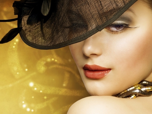 Красивая стильная женщина в черной шляпе 