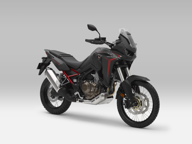 Черный мотоцикл Honda CRF1100L Africa Twin, 2021 года на сером фоне
