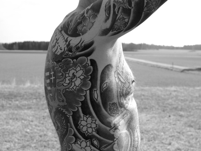 Татуировки на теле мужчины 