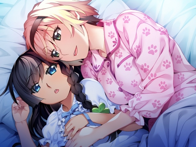 Парень и девушка аниме лежат на кровати