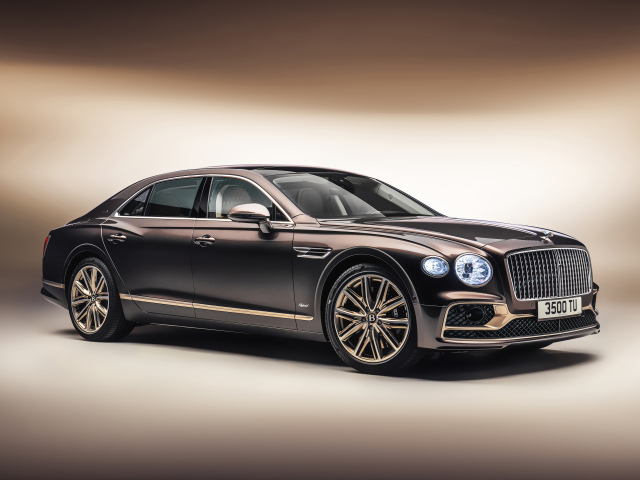 Автомобиль Bentley Flying Spur Hybrid Odyssean Edition 2021 года на сером фоне