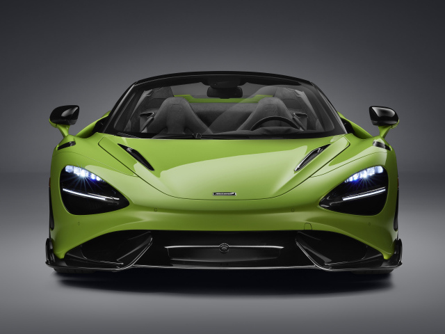 Зеленый McLaren 765LT Spider 2022 года а сером фоне 