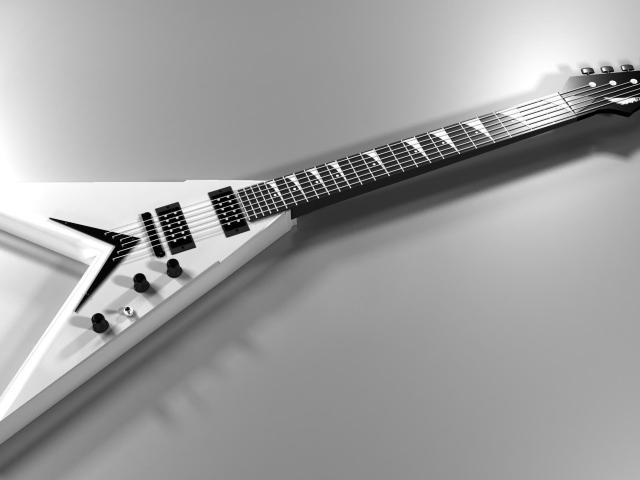 Белая электрогитара на сером фоне 