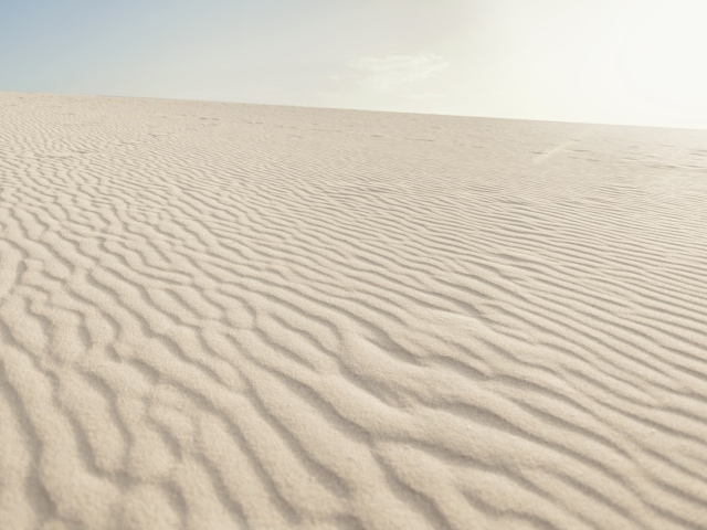 Красивый волнистый белый песок в пустыне