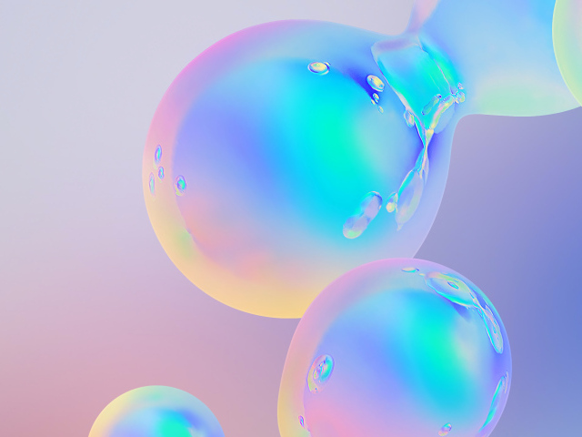 Разноцветные абстрактные пузыри на сером фоне