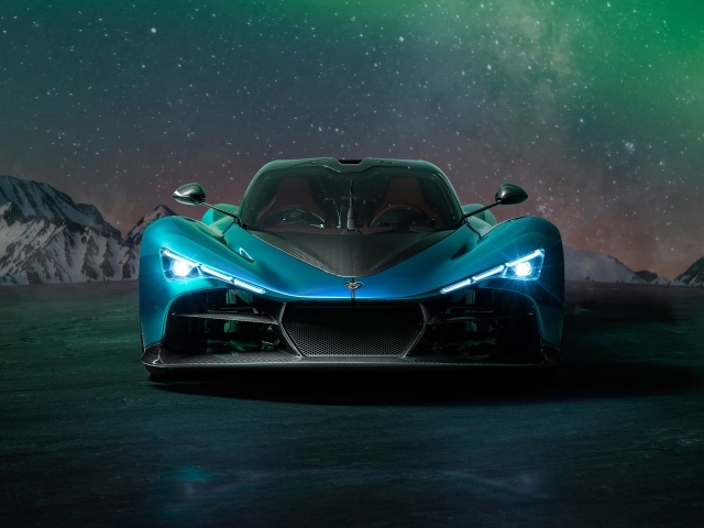 Вид спереди на дорогой автомобиль Zenvo Aurora Agil  ночью