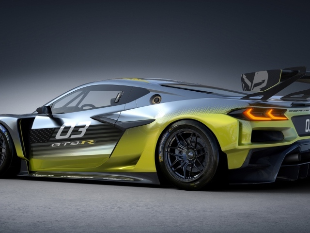 Автомобиль Chevrolet Corvette Z06 GT3 R на сером фоне