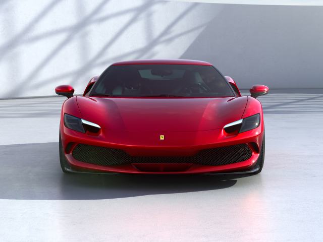 Красный Ferrari 296 GTB 2022 года вид спереди