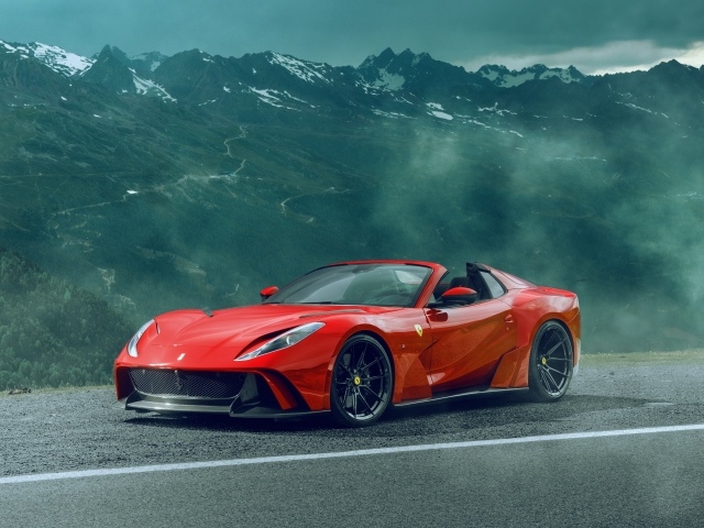 Красный спортивный автомобиль Ferrari 812 GTS N-Largo в горах
