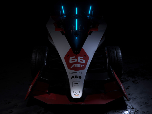 Гоночный автомобиль ABT Sportsline Mahindra M9Electro 2022 на черном фоне