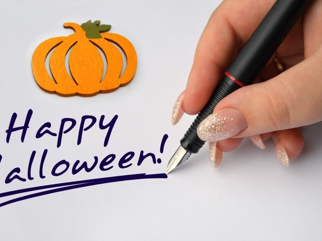 Ручка и надпись на Хэллоуин