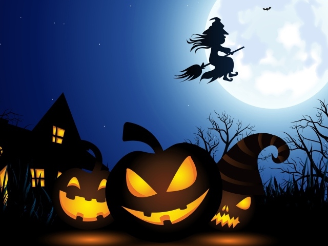 Тыквы и ведьма на праздник Хэллоуин