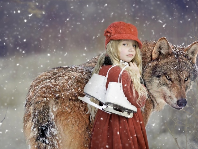 Маленькая девочка с волком зимой