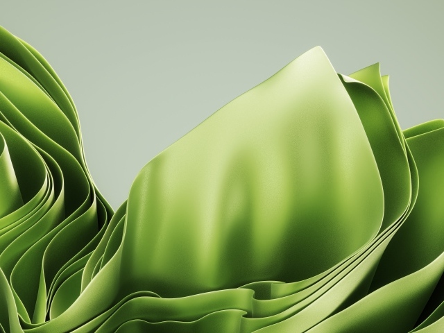 Зеленые абстрактные листья на сером фоне