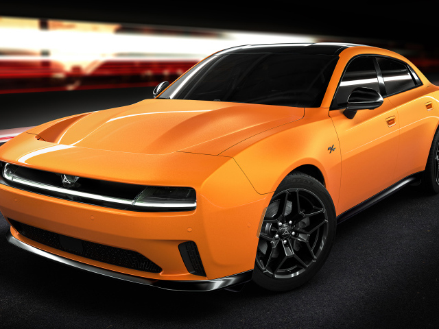 Вид спереди на оранжевый автомобиль Dodge Charger Daytona RT 2025 года