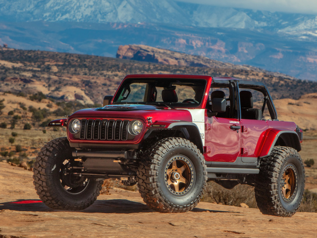 Красный внедорожник Jeep Low Down Concept 2024  года в горах