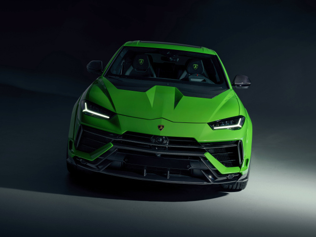 Зеленый автомобиль Lamborghini Urus на черном фоне