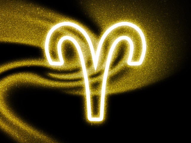 Золотистая пыль со знаком зодиака овен на черном фоне