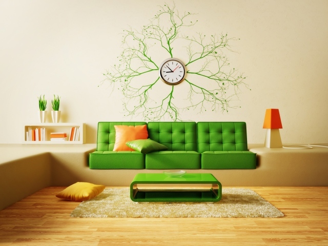Зеленый диван в комнате с часами
