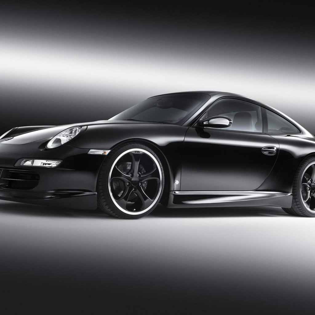Черный Порше с черными литыми дисками