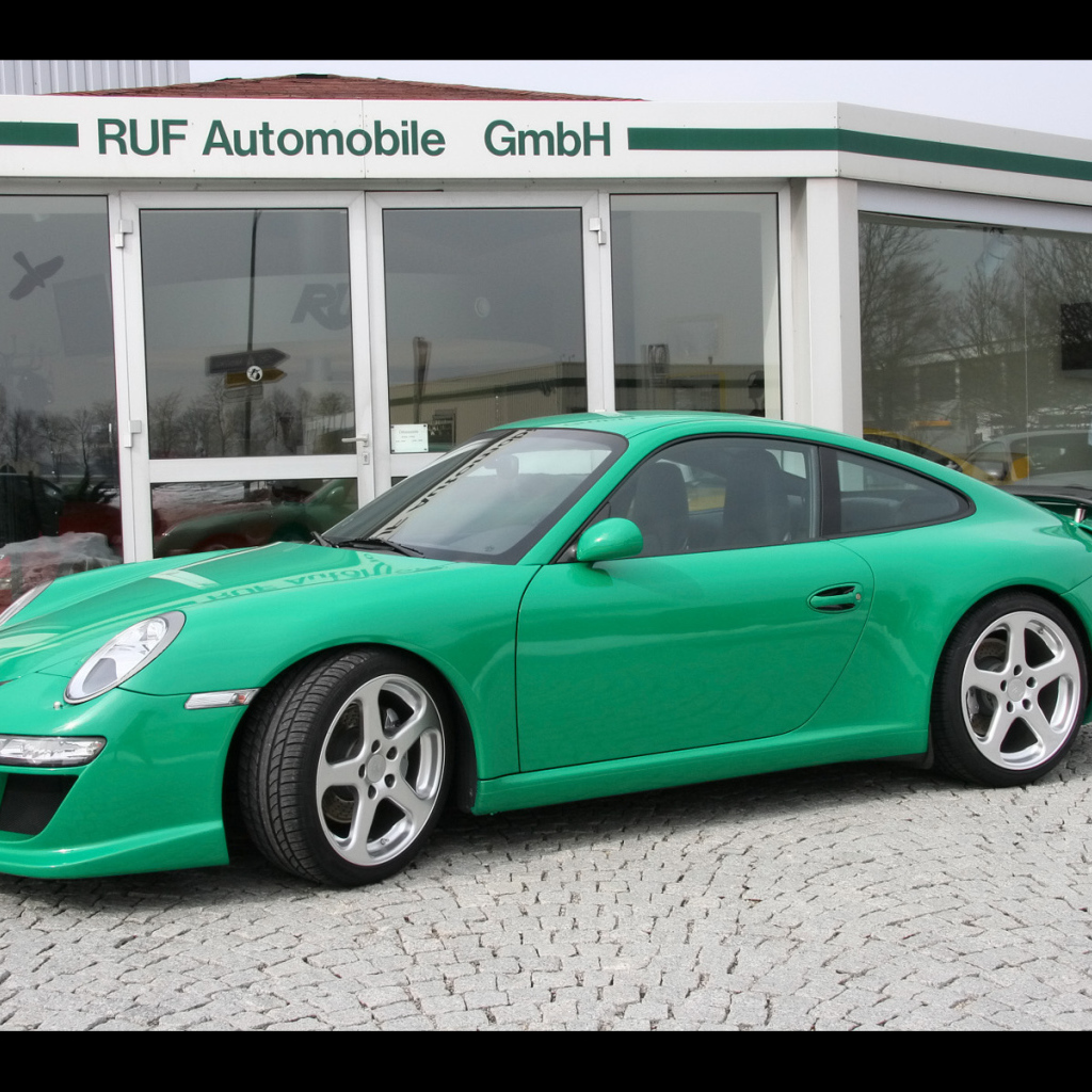 Зеленый Porsche Kompressor