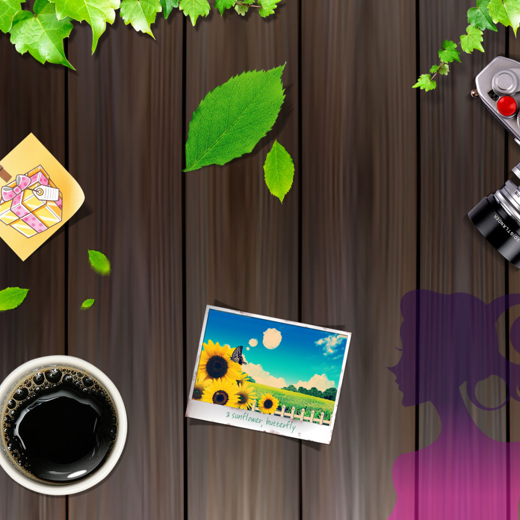 Фотоаппарат на рабочем столе