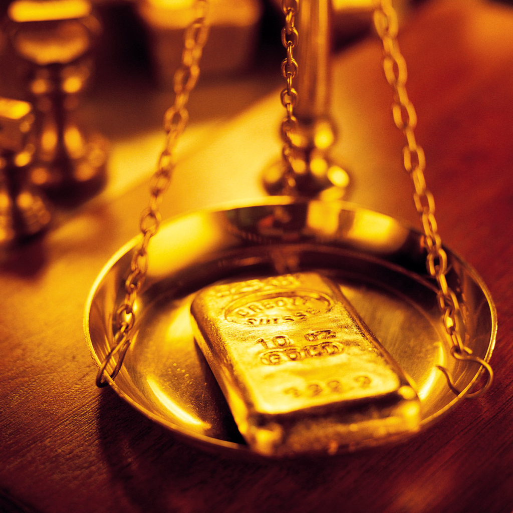 Gold bullion on the scales