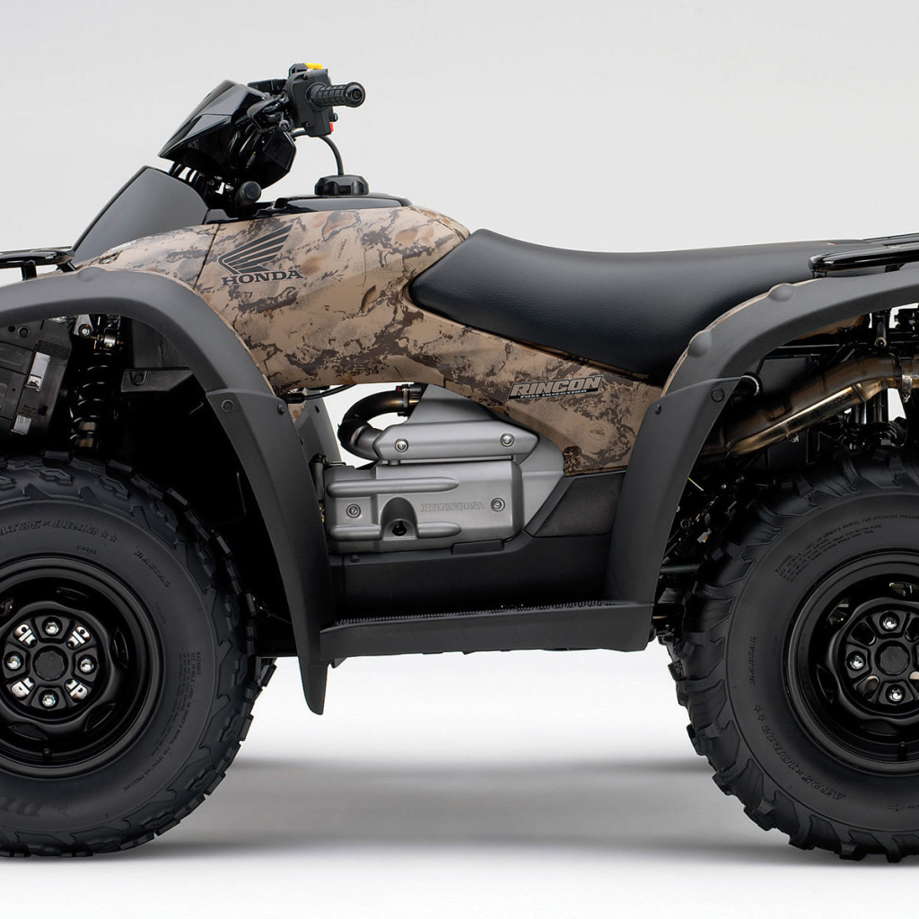 Коричневый Honda квадроцикл