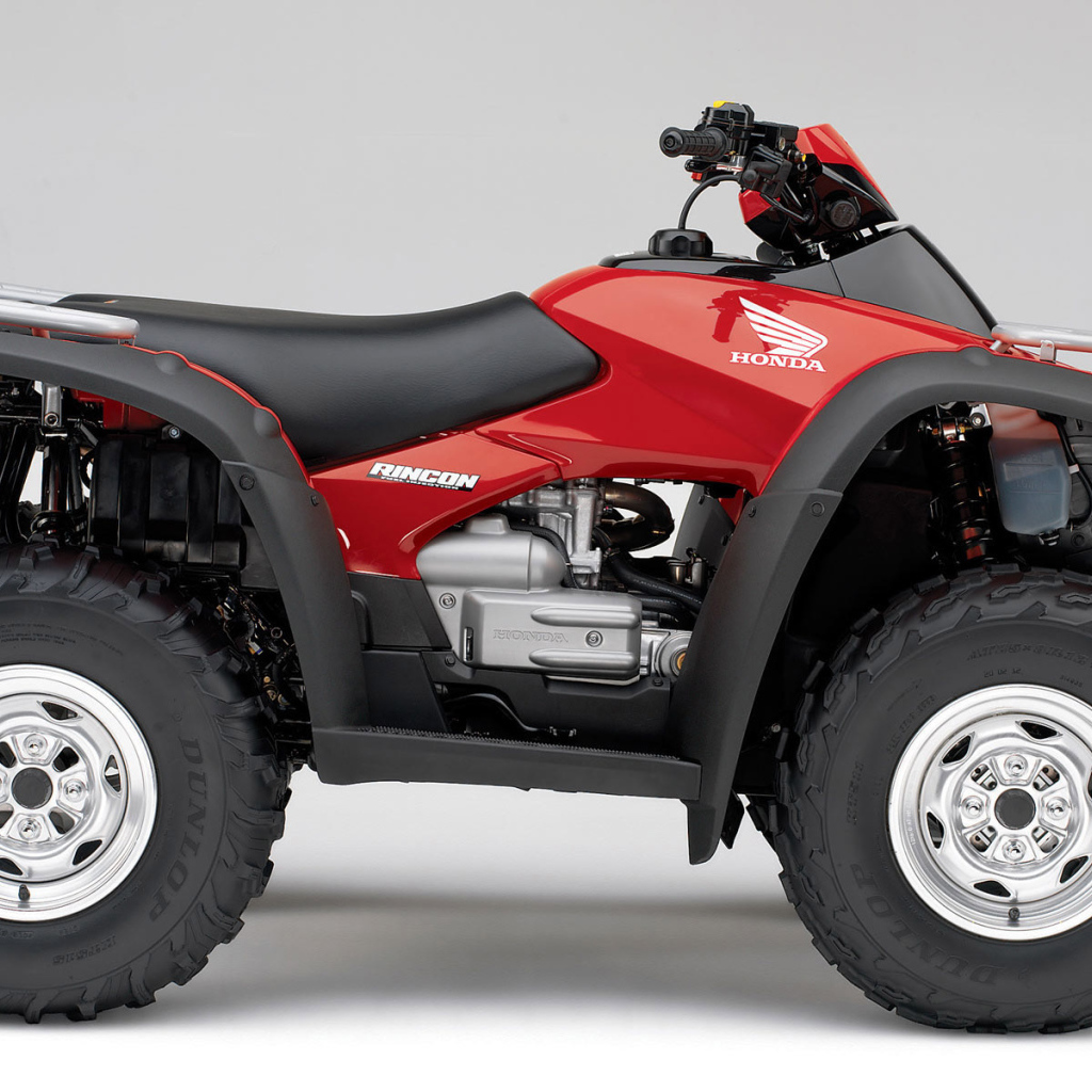 Красный Honda Rincon квадроцикл