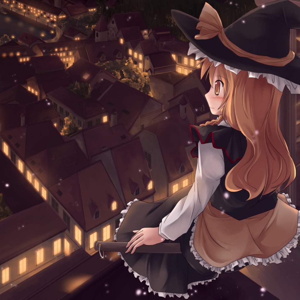 Девочка сидит на крыше