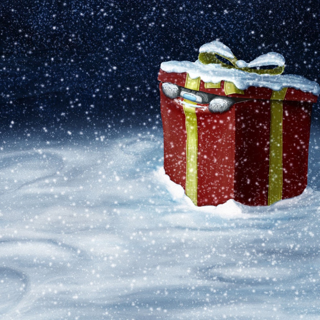 Медведь лезет из подарочной коробки на рождество